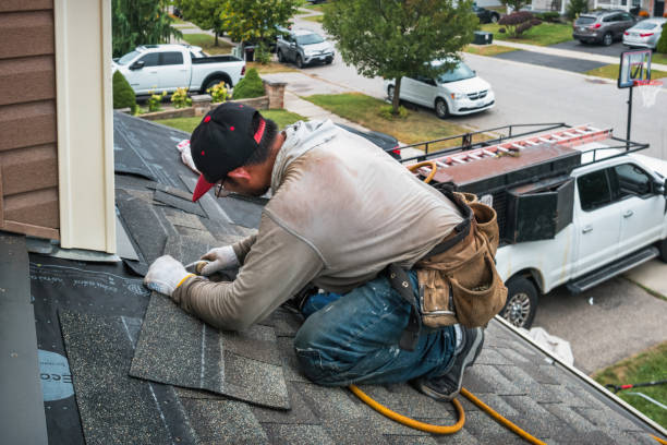 Professional Gutter Installation technician working in Roanoke, VA